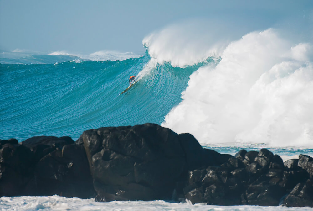 Kelly Slater surfing Waimea Bay
