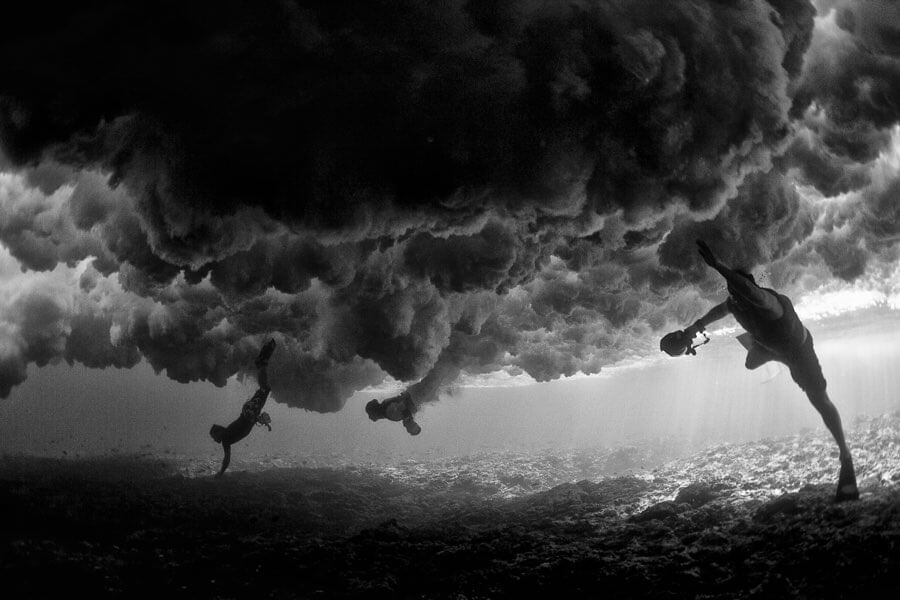 Surf photographers underwater