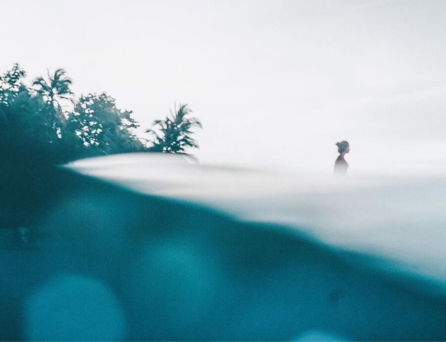 Under over water view of surfer, Elise Trigger