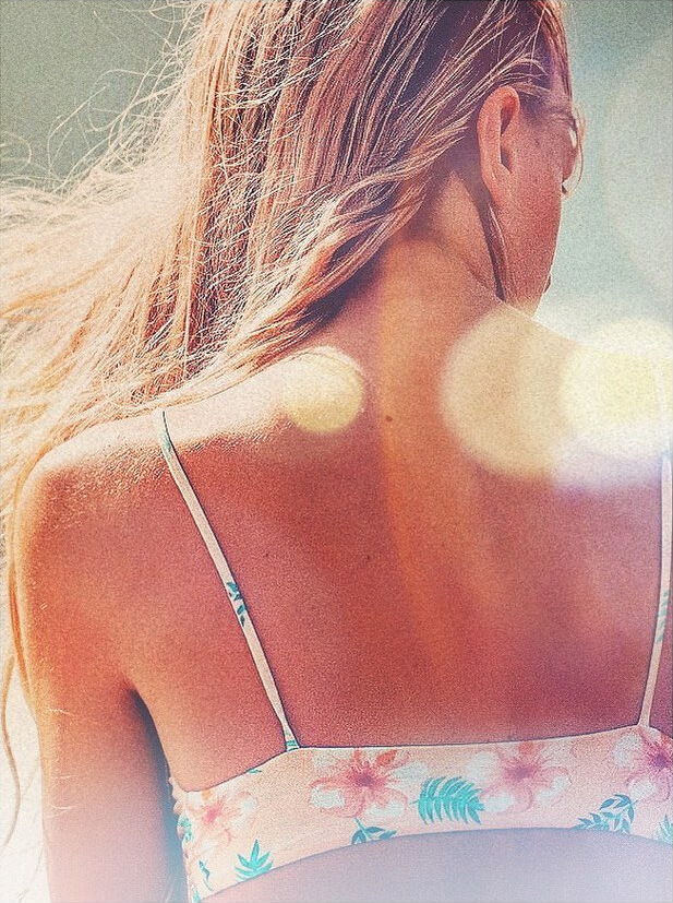 Cropped photo of woman in a bikini