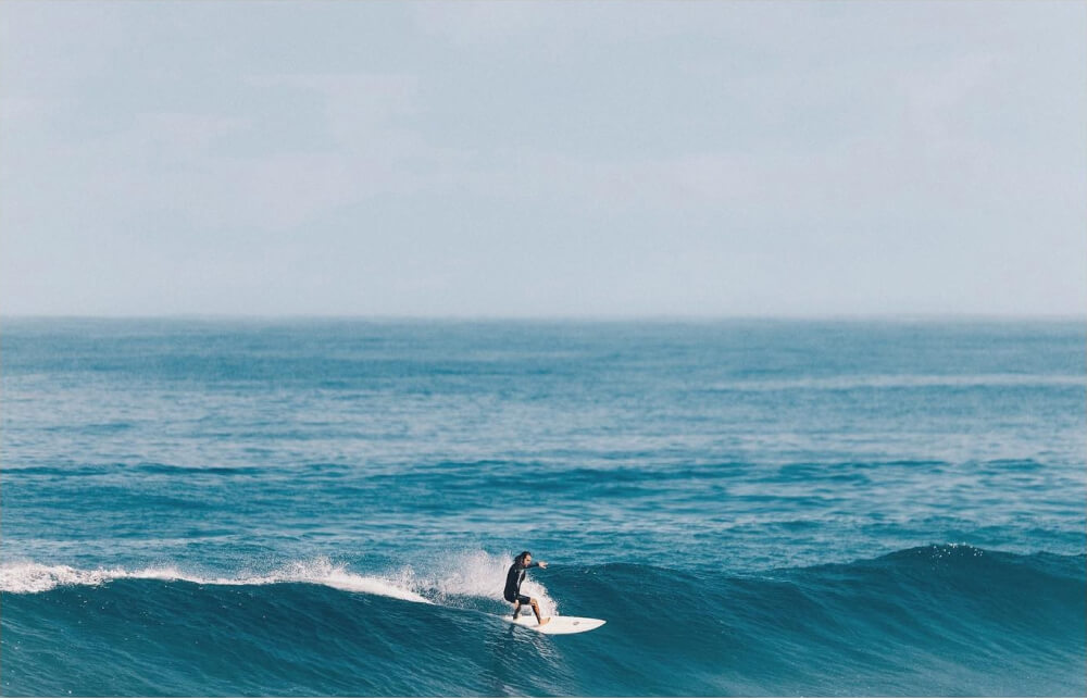 Shortboard surfer riding a wave