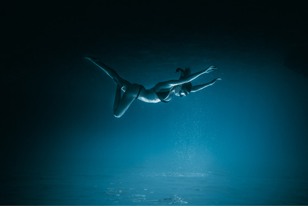 Woman suspended underwater