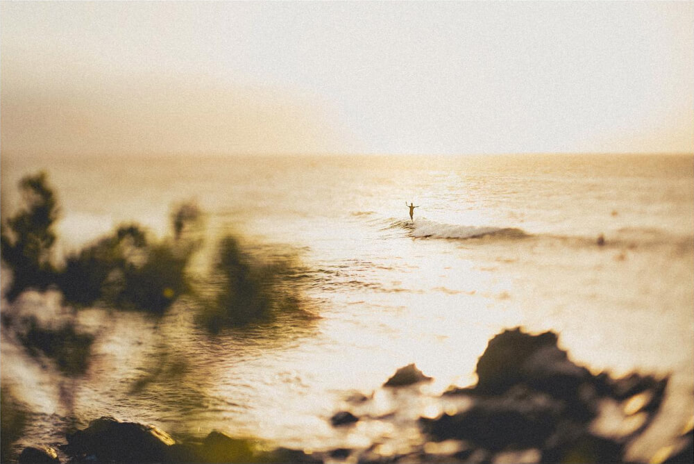 Looking out to sea with a surfer in the distance