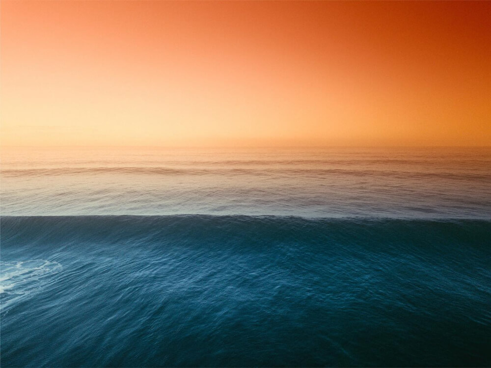 Maui wildfire red sky over the ocean
