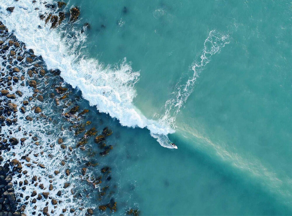 Birdseye view of surfer