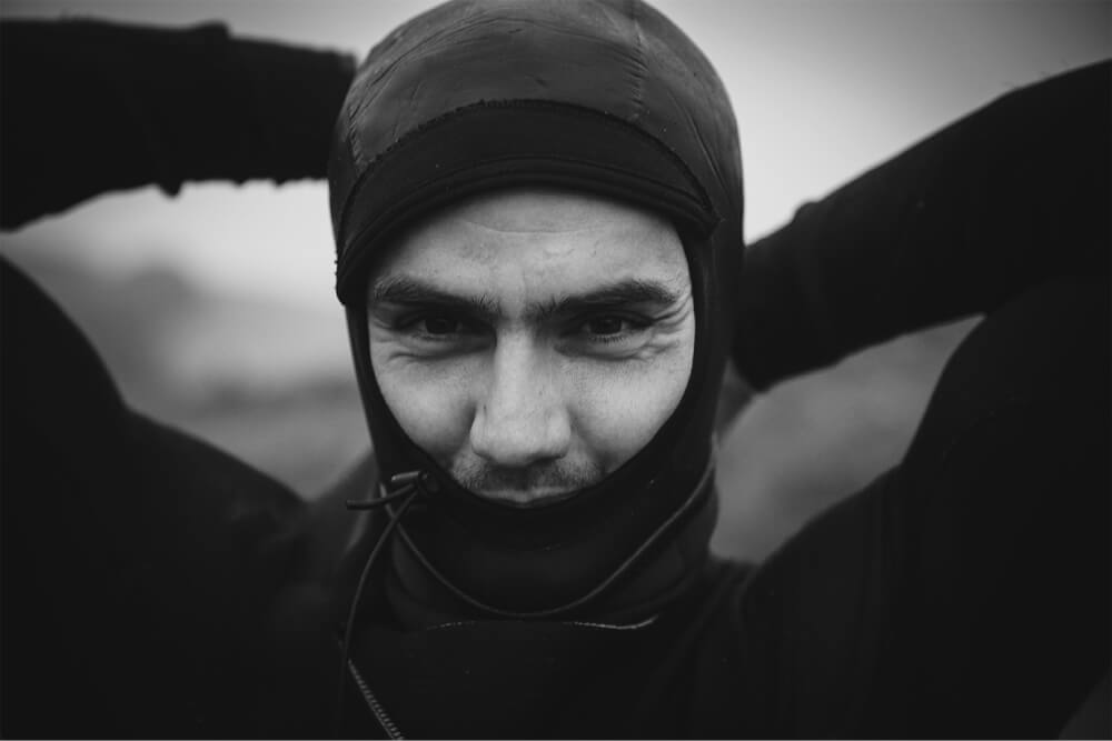 Portrait of male surfer in a cold water wetsuit