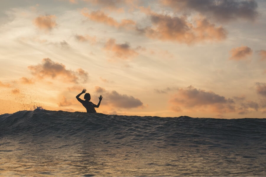Surfer at sunset