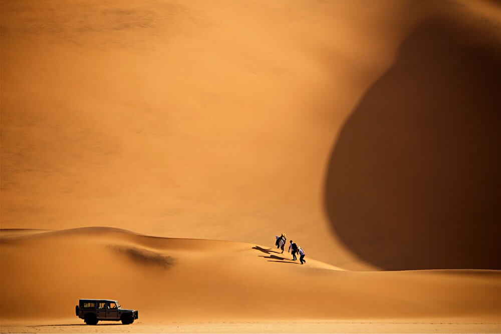 Surfers in the desert