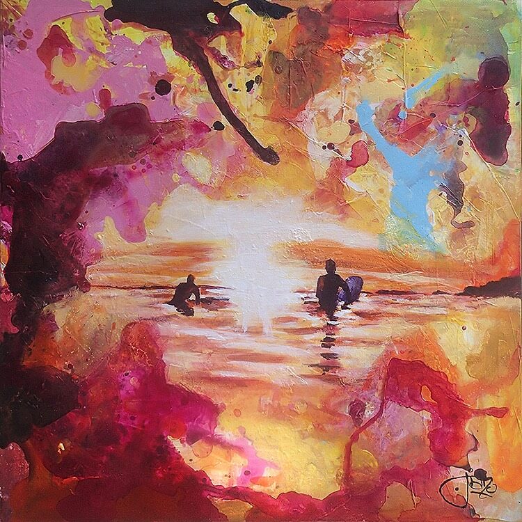 Surfers sitting out back