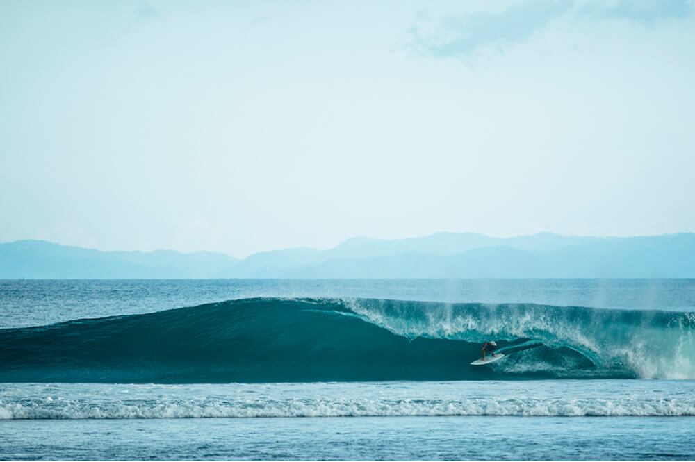 Surfer riding a wave